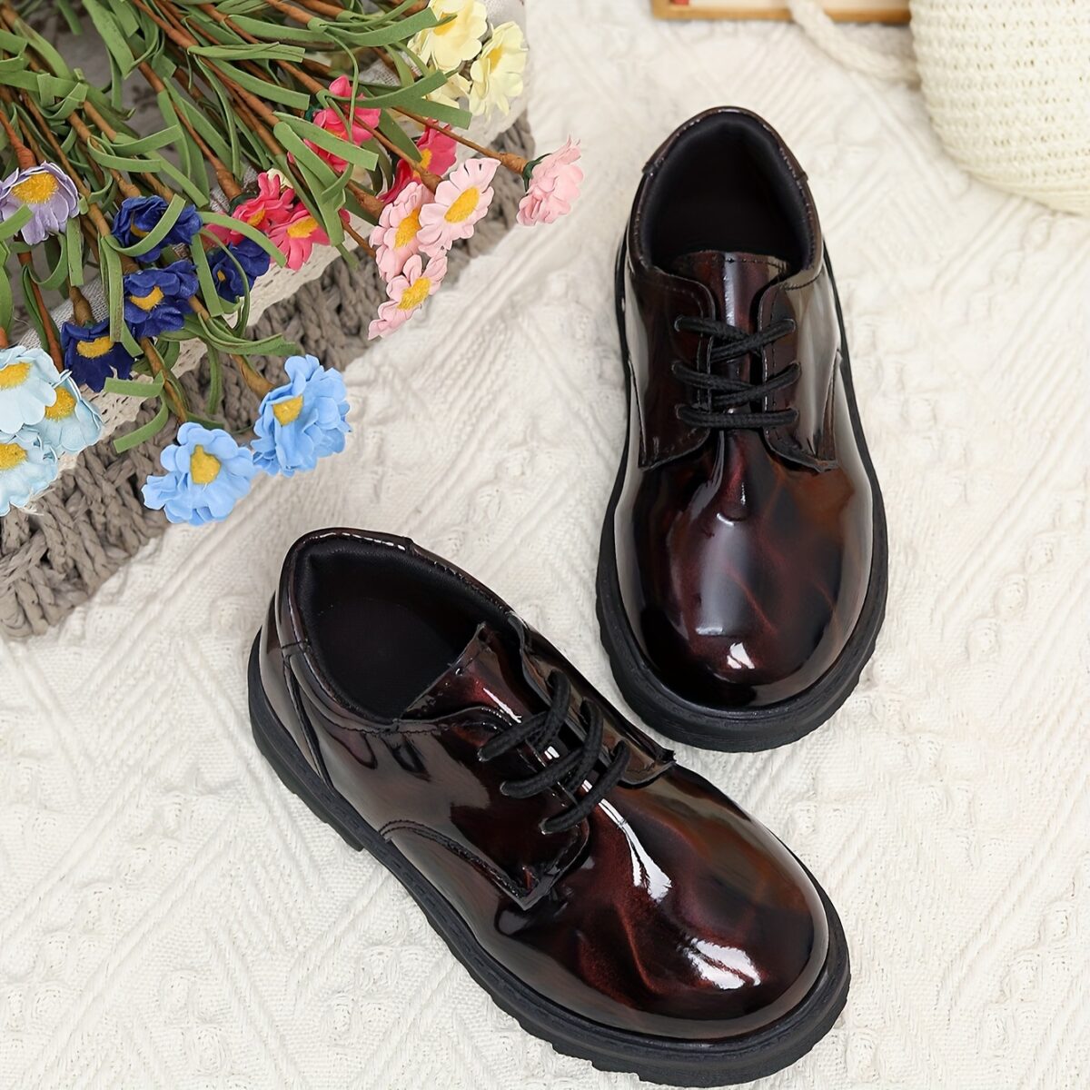 Adorable baby boy wearing stylish and comfortable Newness Little Gentleman shoes