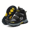 Stylish and durable FANGFIUP Kids Winter Boots perfect for snowy adventures These boots are shown in action with a child playing in the snow