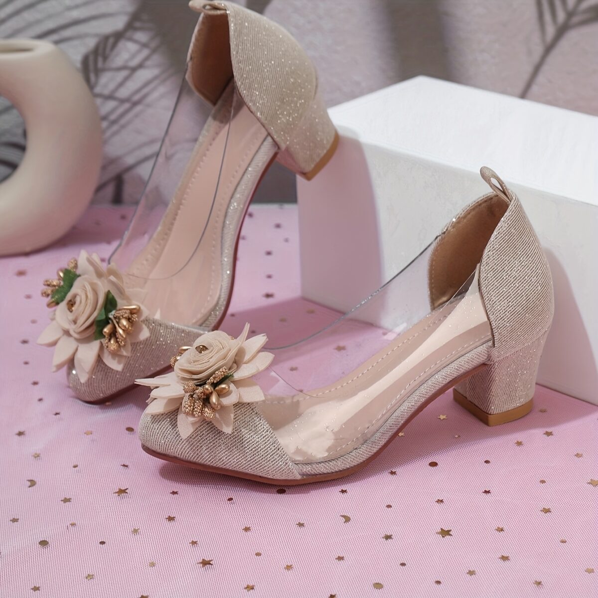 Adorable little girl wearing Newness Enchanted Garden Girls Block Heels showcasing the charming design and comfortable block heel
