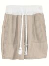 Newness Effortless Knit Summer Set A luxurious knit two piece set perfect for summer Model wears a relaxed fit knit top and matching skirt in a soft summery color