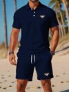 Newness Riviera Escape Mens Navy Polo Set A stylish navy polo shirt and shorts set perfect for summer The model is wearing the set looking relaxed and confident