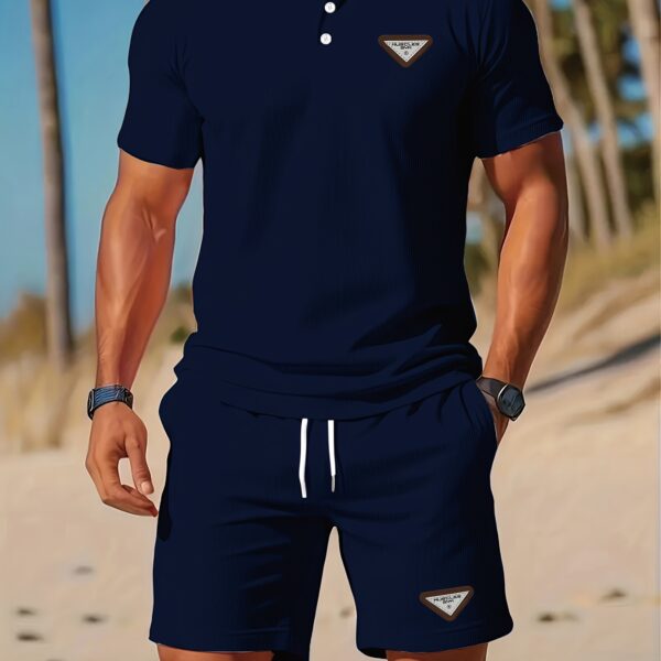 Newness Riviera Escape Mens Navy Polo Set A stylish navy polo shirt and shorts set perfect for summer The model is wearing the set looking relaxed and confident