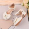 Adorable girls Pearl  Bow Mary Janes in white perfect for weddings parties and special occasions Featuring delicate pearls and charming bows