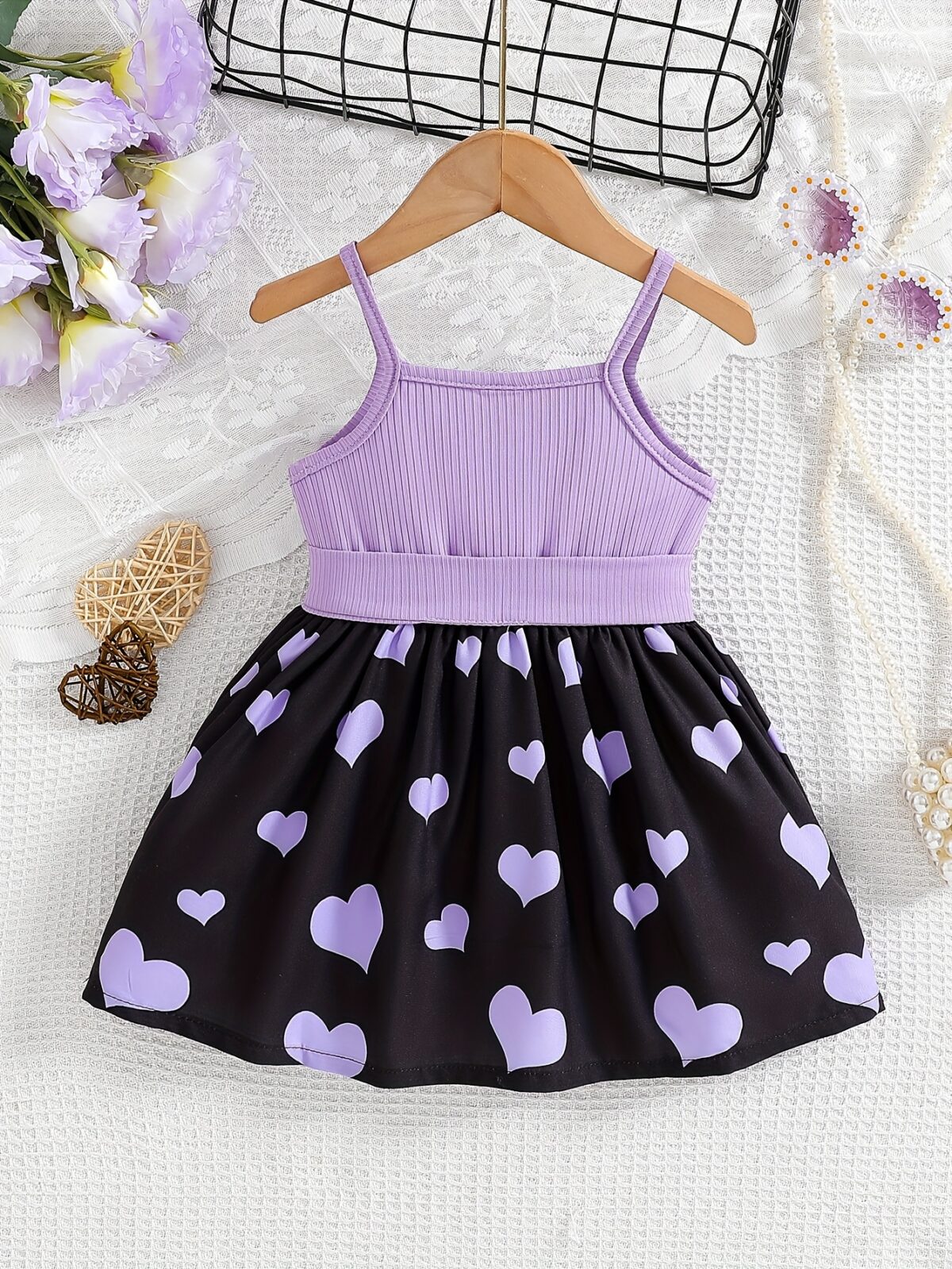 Sweetheart Summer Toddler Dress   Adorable little girl wearing a charming pink and white summer dress perfect for summer parties and outdoor play