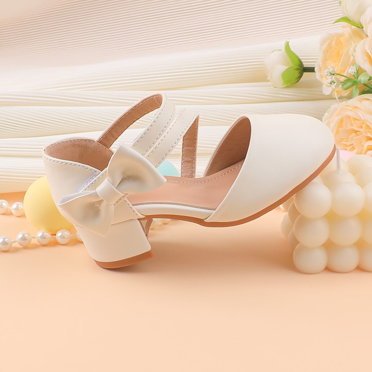 Adorable girls Mary Jane shoes with a delicate bow detail perfect for weddings parties and special occasions