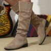 Newness Slouchy Suede Mid Calf Boots in rich brown suede leather showcasing the comfortable slouchy fit and mid calf height Perfect for adding a touch of effortless chic to any winter outfit
