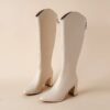Newnesss Elevated Beige Knee High Boots Elegant beige leather boots that extend to the knee perfect for any occasion