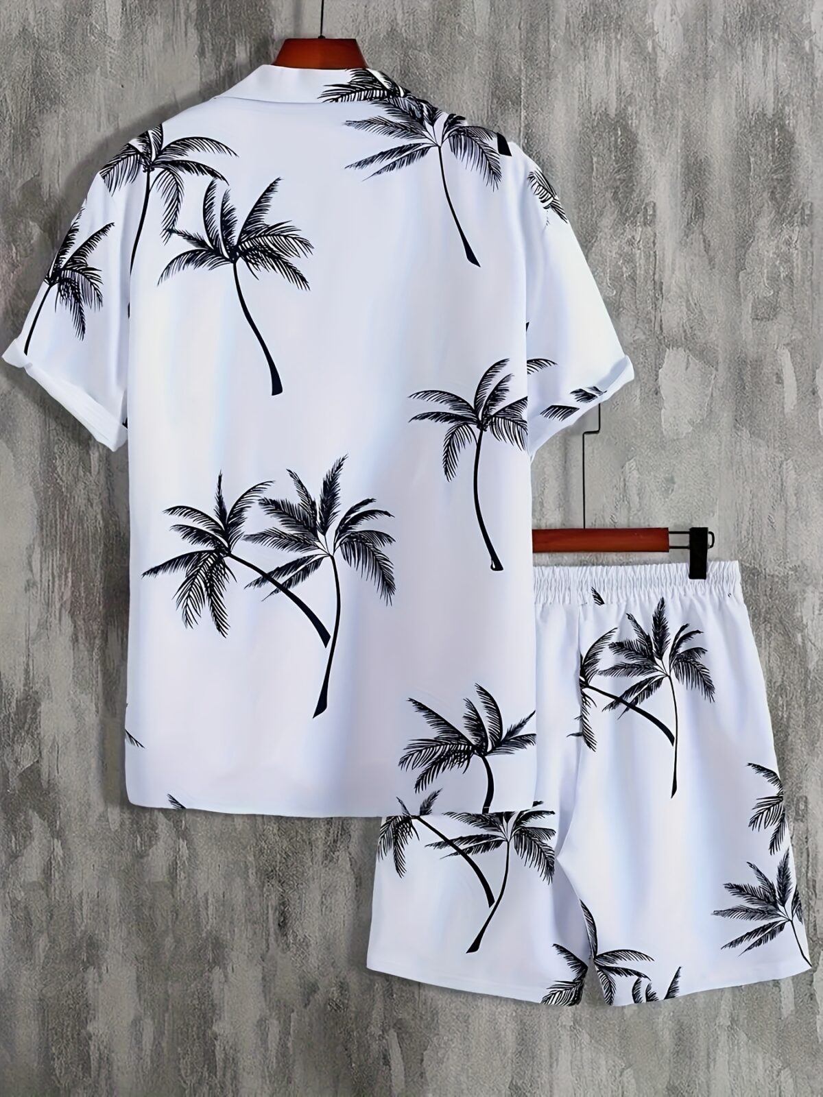 Embrace vacation vibes with the Newness Riviera Escape Palm Print Set This comfortable two piece set is crafted from lightweight polyester perfect for warm weather