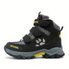 Stylish and durable FANGFIUP Kids Winter Boots perfect for snowy adventures These boots are shown in action with a child playing in the snow