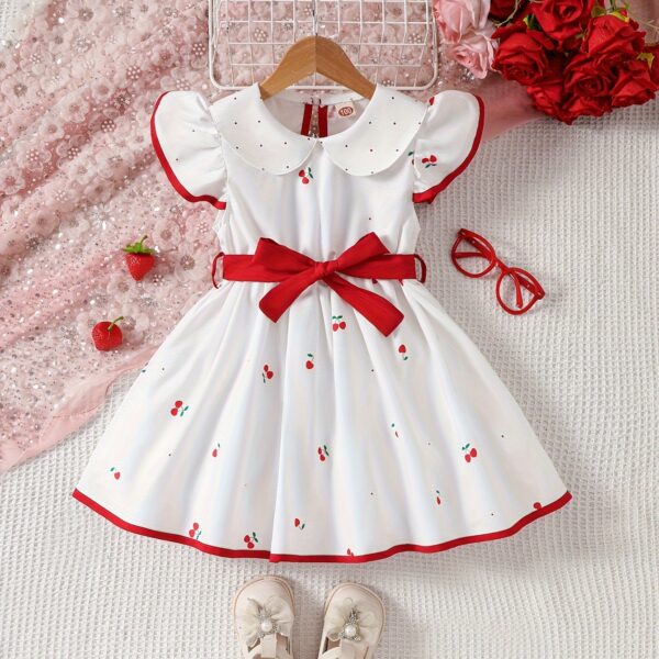 Sweet Cherry Print Dress with Bow from Newness A charming cherry printed dress with a cute bow