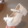Celestial Bow  Pearl Girls Dress Shoes by Newness Elegant white dress shoes with a delicate bow and pearls perfect for weddings and parties