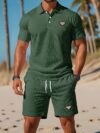 Newness Riviera Escape Mens Navy Polo Set A stylish navy polo shirt and shorts set perfect for summer The model is wearing the set looking relaxed and confident