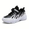 Stylish and comfortable Velocity Youth Sneakers in a range of colors perfect for school sports or play Showcasing the shoes design and versatility