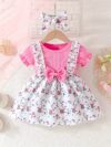 Adorable baby girl wearing a lightweight Summer Meadow floral print dress perfect for casual summer outings