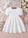 Adorable Little Darling Girls Party Dress from Newness perfect for birthdays weddings or any special occasion The dress features insert details about the dress eg a beautiful floral print sparkly sequins a flowing skirt