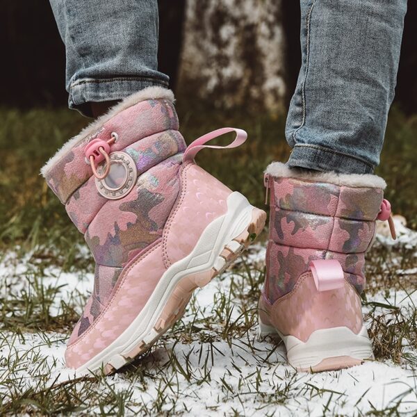 Stylish and warm Arctic Explorer Kids Snow Boots by Newness, perfect for winter adventures. Kids snow boots in action, showcasing their waterproof and insulated design.