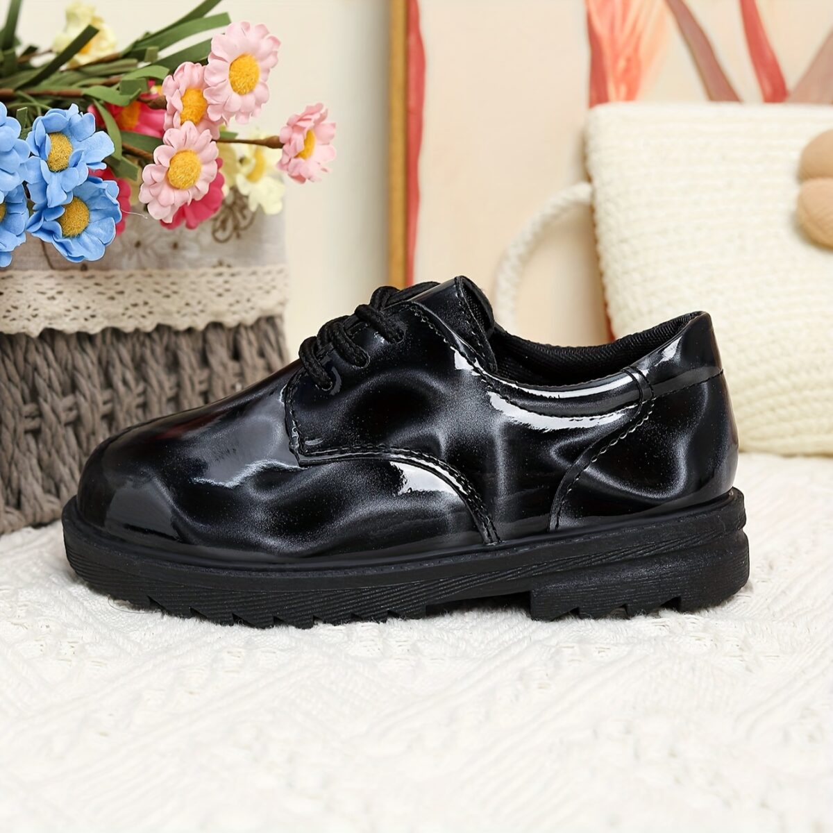 Adorable baby boy wearing stylish and comfortable Newness Little Gentleman shoes