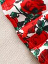 Adorable baby girl wearing a rose garden print dress perfect for fall and winter
