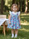 Adorable baby girl wearing a summer heart print dress perfect for school and special occasions