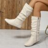 Effortlessly Chic Slouchy Boots in brown leather These stylish boots feature a slouchy fit and sleek design perfect for elevating any outfit