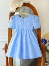 Adorable Little Darling Girls Party Dress from Newness perfect for birthdays weddings or any special occasion The dress features insert details about the dress eg a beautiful floral print sparkly sequins a flowing skirt