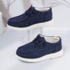 Stylish and comfortable Coastal Breeze boys canvas sneakers in blue perfect for everyday adventures The sneakers feature a classic design with comfortable canvas material