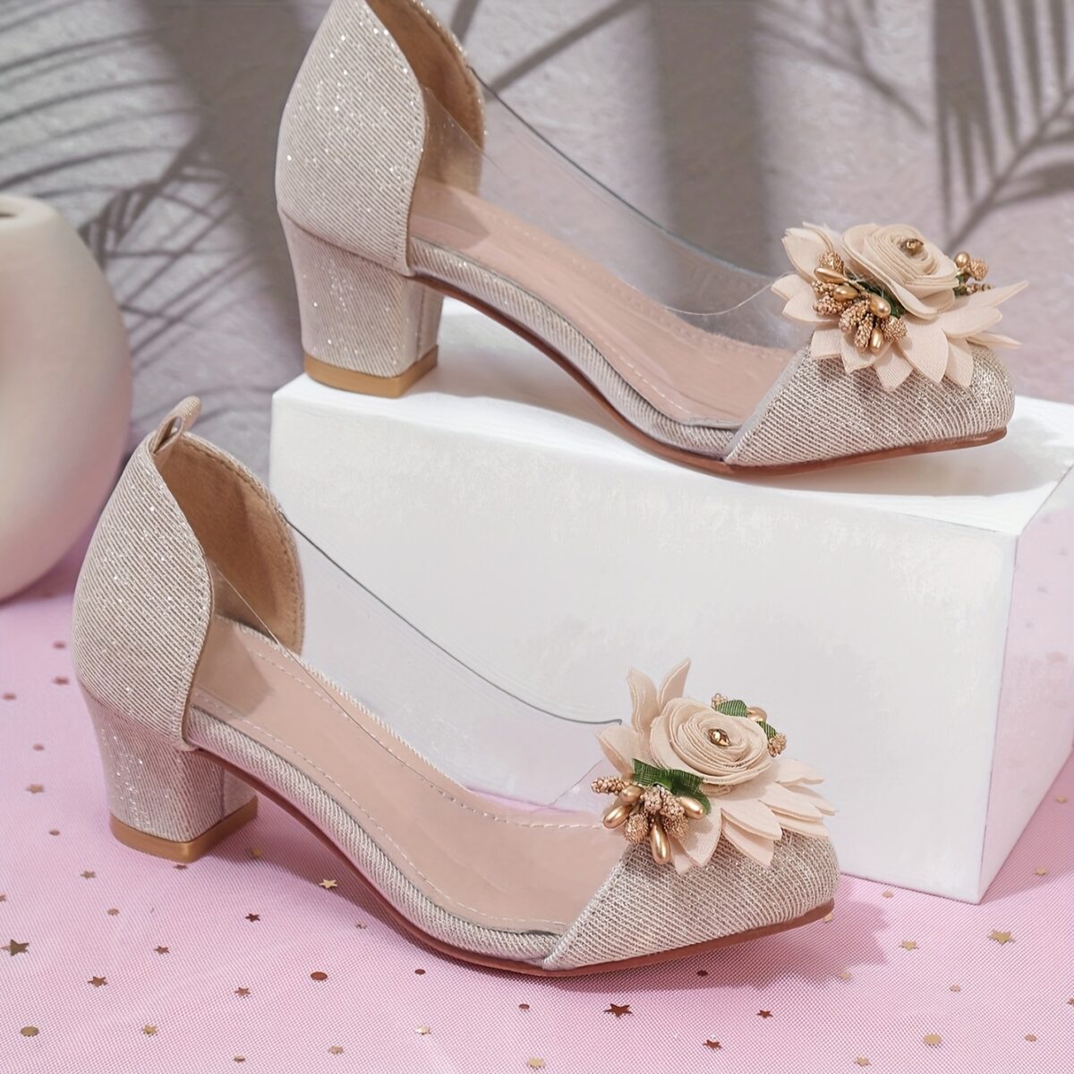 Adorable little girl wearing Newness Enchanted Garden Girls Block Heels showcasing the charming design and comfortable block heel