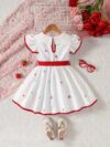 Sweet Cherry Print Dress with Bow from Newness A charming cherry printed dress with a cute bow
