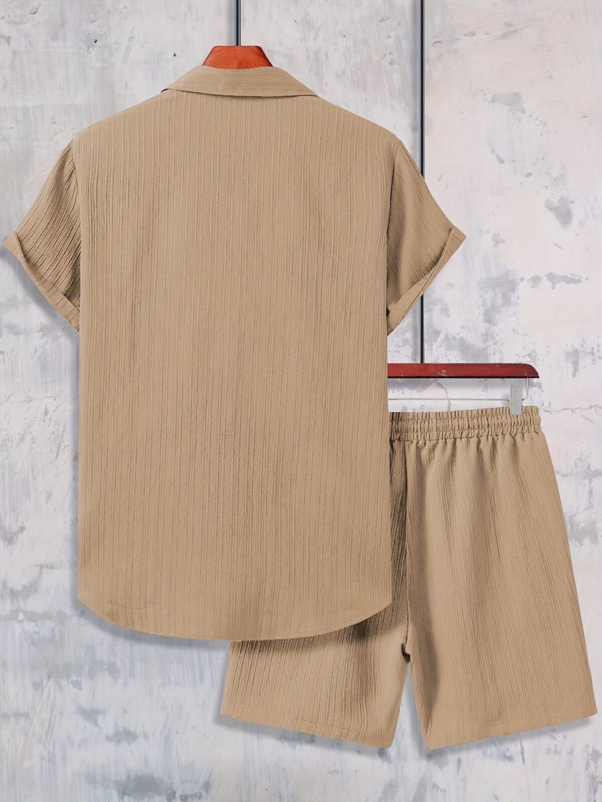 The Newness Riviera Escape Mens Summer Set A stylish and comfortable two piece outfit perfect for summer The model is wearing a crisp white shirt and coordinating shorts