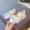 Girls stylish LED Glow Shoes from Newness in a fun and vibrant color The shoes light up are comfortable and perfect for parties