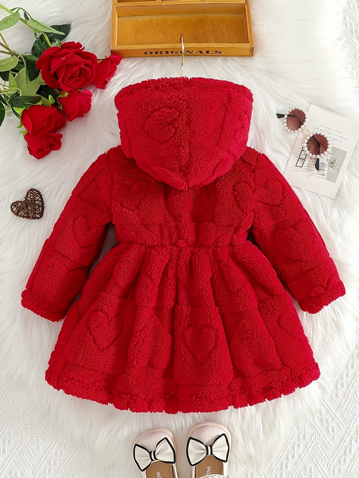 Baby girl wearing an adorable red heart patterned dress Perfect for Fall and Winter