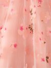 Adorable little girl twirling in a beautiful rosebud garden floral print dress perfect for weddings or a casual day out