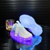 Kids GUANGLAN Nova Glow Shoes lighting up at night showcasing their lightweight and durable design Perfect for nighttime play and adventures