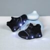 Glowing Cloud Kids Slip On Sneakers in action A childs feet wearing the stylish and comfortable Newness slip on sneakers ready for play The shoes are light colored and feature a unique design