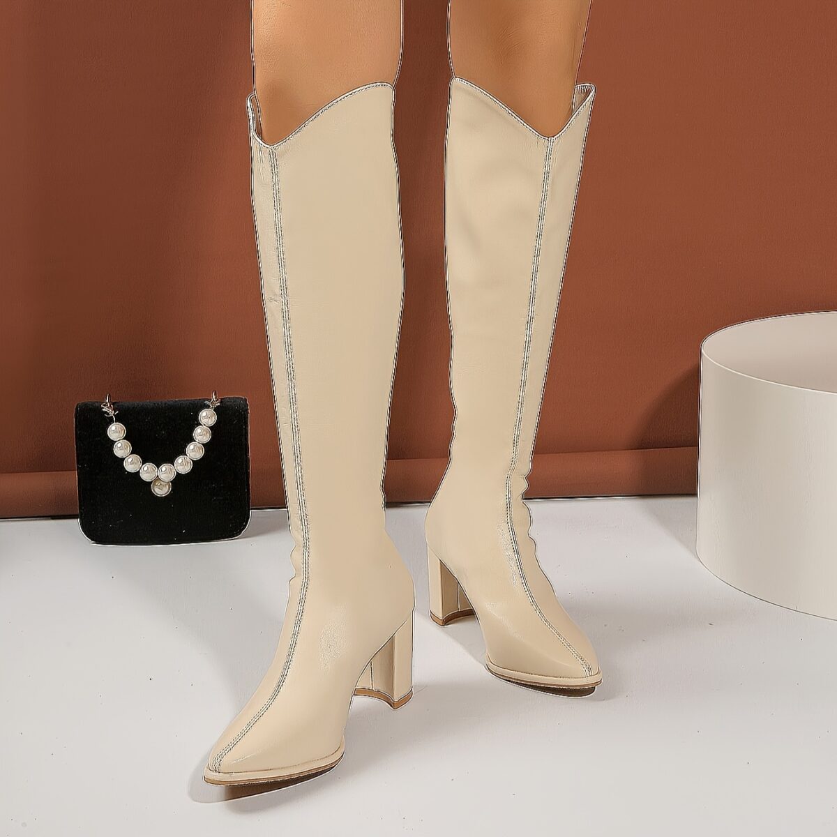 Newnesss Elevated Beige Knee High Boots Elegant beige leather boots that extend to the knee perfect for any occasion