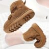 Stylish and warm Arctic Explorer Kids Winter Boots by Newness perfect for winter adventures Showcasing their waterproof design and rugged outsole