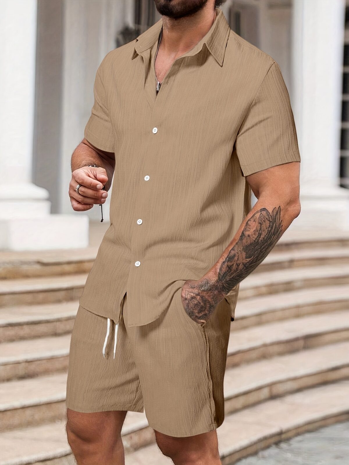 The Newness Riviera Escape Mens Summer Set A stylish and comfortable two piece outfit perfect for summer The model is wearing a crisp white shirt and coordinating shorts