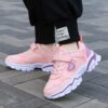 Newness Starlight Glow Running Shoes Trendy black and pink luminous running shoes showcasing comfort and style