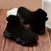Stylish and comfortable Newness Cloudwalkers Kids High Tops in action perfect for active play A childs feet are shown wearing the high top sneakers while engaged in energetic activity
