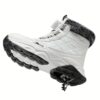 Kids wearing stylish and warm FANGFIUP Explorer Winter Boots playing in the snow