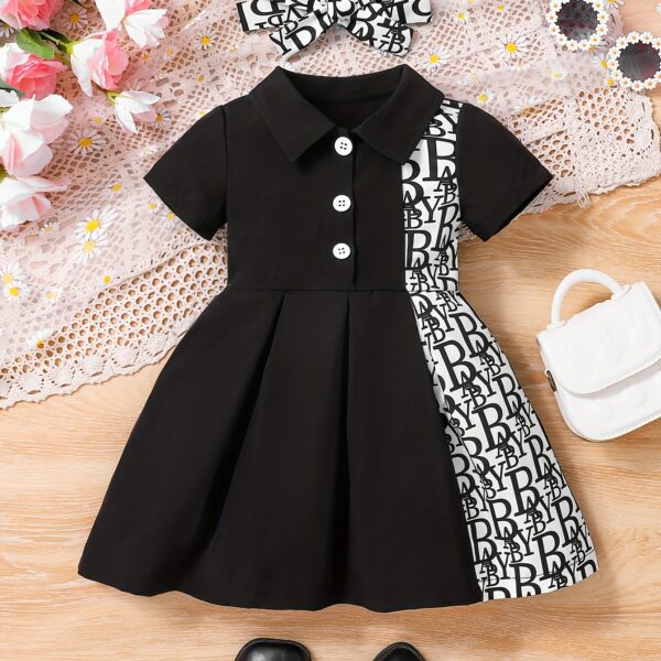 Adorable baby girl in a stylish and comfortable summer dress from Newness perfect for a playdate
