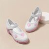 Adorable Princess Heart Girls Party Shoes in pink and white perfect for birthdays and special occasions Featuring a heart shaped design and comfortable fit