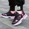 Newness Starlight Glow Running Shoes Trendy black and pink luminous running shoes showcasing comfort and style
