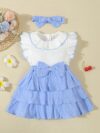 Adorable toddler girl in a vibrant Summer Bloom dress perfect for summer adventures The dress features a playful floral print and comfortable breathable fabric