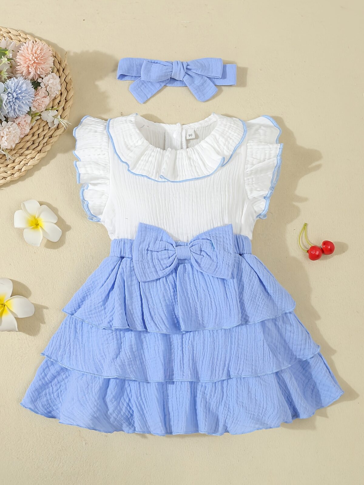 Adorable toddler girl in a vibrant Summer Bloom dress perfect for summer adventures The dress features a playful floral print and comfortable breathable fabric