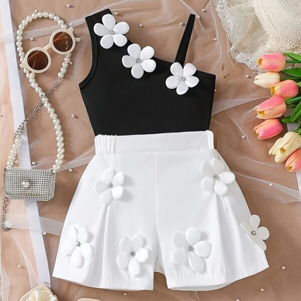 Adorable Summer Bloom floral shorts set in a vibrant print perfect for outdoor play Model is wearing the matching shorts and top