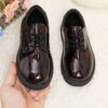 Adorable baby boy wearing stylish and comfortable Newness Little Gentleman shoes