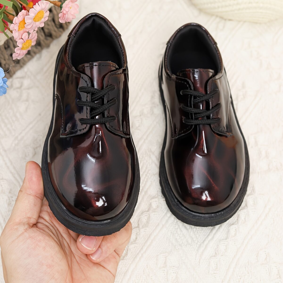 Adorable baby boy wearing stylish and comfortable Newness Little Gentleman shoes