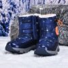 Stylish and warm Arctic Explorer Kids Snow Boots by Newness perfect for winter adventures Kids snow boots in action showcasing their waterproof and insulated design
