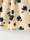 Baby girl wearing adorable Summer Bloom floral print dress Newness baby clothes